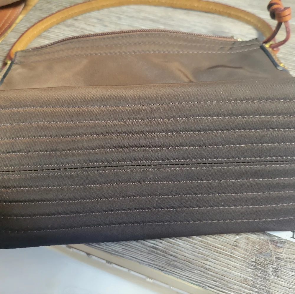 Dooney and Bourke Brown nylon Hand bag‎
